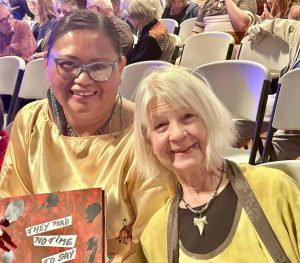 Kimberly Wahpepah and Sandi Ludescher with the They Had No Time To Say Goodbye book. 